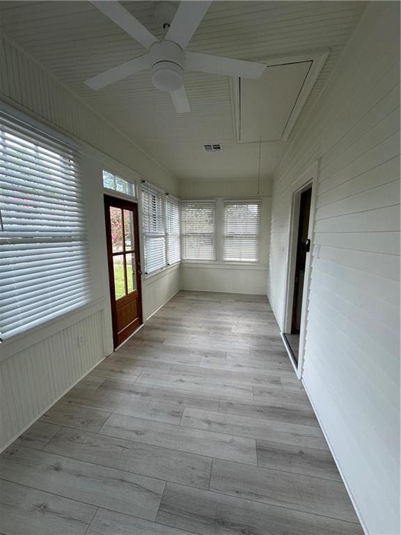 1401 Jefferson St, Gretna, LA 70053 - unfurnished sunroom featuring wood finished floors