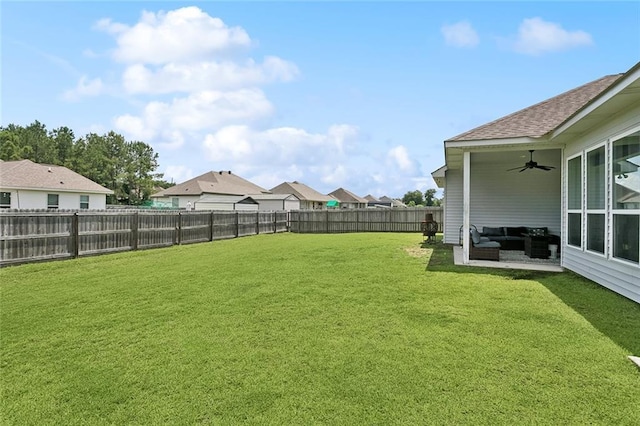 20039 Kenny Ln, Covington, LA 70435 - fenced backyard with a ceiling fan, an outdoor living space, and a residential view