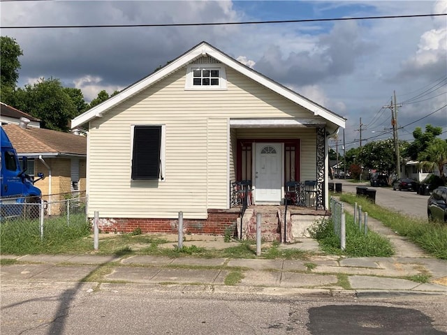 1640 Poland Ave, New Orleans, LA 70117 - view of front of home featuring covered porch