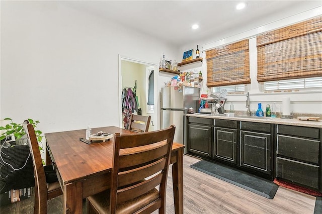 1640 Poland Ave, New Orleans, LA 70117 - dining area featuring light wood-type flooring and recessed lighting