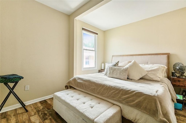 1640 Poland Ave, New Orleans, LA 70117 - bedroom featuring dark wood-type flooring and baseboards