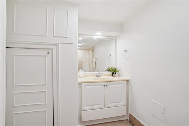 1303 Burgundy St Unit 3, New Orleans, LA 70116 - bathroom with vanity and baseboards