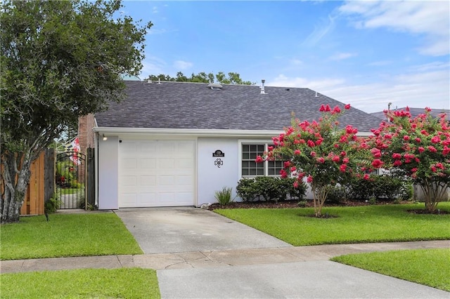 159 Valerie St, River Ridge, LA 70123 - view of front of property featuring a shingled roof, driveway, stucco siding, and an attached garage