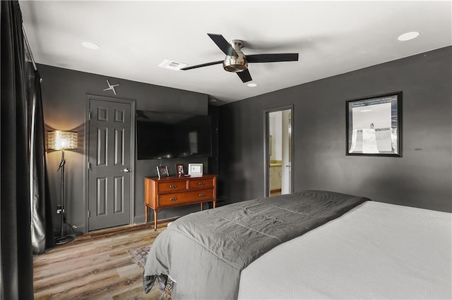 159 Valerie St, River Ridge, LA 70123 - bedroom featuring wood finished floors, a ceiling fan, and recessed lighting