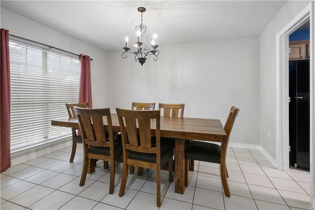 3225 Ridgeline Dr, Slidell, LA 70460 - dining space featuring a chandelier and light tile patterned floors