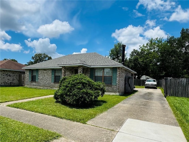 6655 Dalark Dr, Baton Rouge, LA 70812 - view of front of home with brick siding, concrete driveway, and a shingled roof
