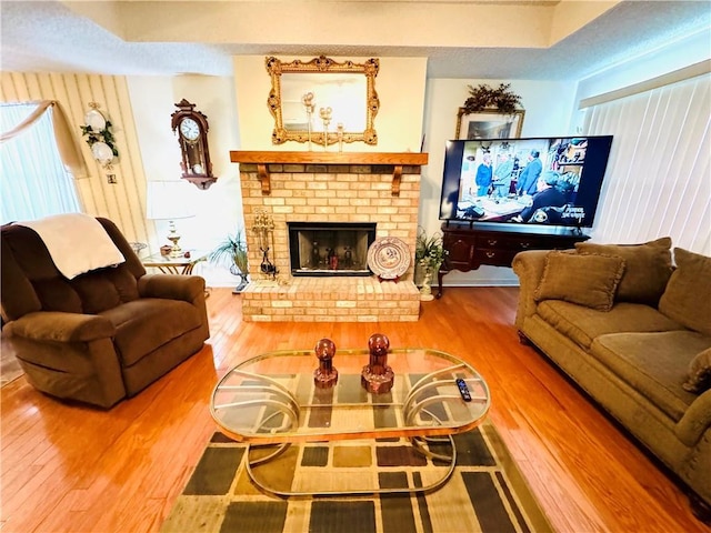 6655 Dalark Dr, Baton Rouge, LA 70812 - living area featuring wood finished floors and a fireplace