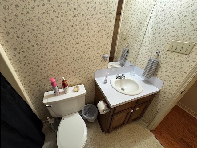 6655 Dalark Dr, Baton Rouge, LA 70812 - bathroom featuring vanity and wallpapered walls