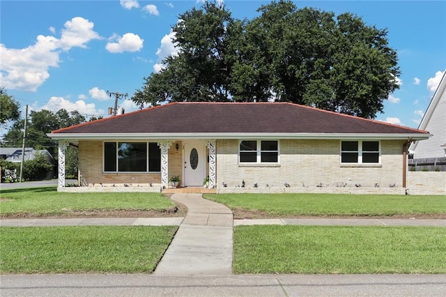 40 Holly Dr, Gretna, LA 70053 - single story home with a front yard and brick siding