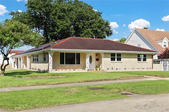 40 Holly Dr, Gretna, LA 70053 - view of front of home featuring a front yard and a porch
