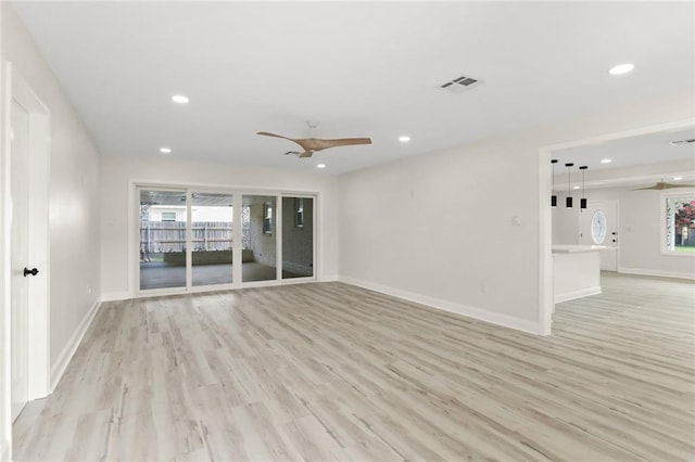 40 Holly Dr, Gretna, LA 70053 - spare room with ceiling fan, light wood finished floors, and recessed lighting