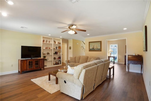 4740 Avron Blvd, Metairie, LA 70006 - living room featuring a ceiling fan, stairway, ornamental molding, dark wood-style flooring, and recessed lighting