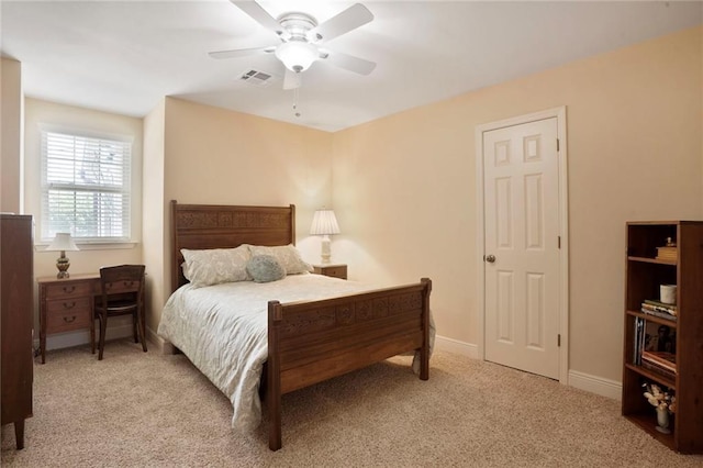 4740 Avron Blvd, Metairie, LA 70006 - bedroom with light carpet and a ceiling fan