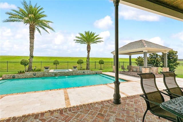 24 Royal Palm Dr, Kenner, LA 70065 - view of pool featuring a gazebo, an in-ground hot tub, a patio, and a fenced backyard
