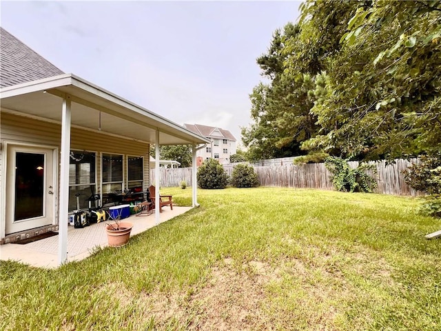 146 Emerald Oaks Dr, Covington, LA 70433 - fenced backyard featuring a patio area