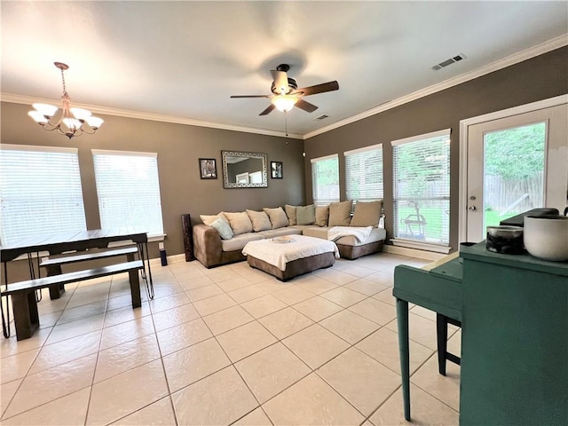 146 Emerald Oaks Dr, Covington, LA 70433 - living area featuring light tile patterned floors, ceiling fan, a chandelier, plenty of natural light, and ornamental molding