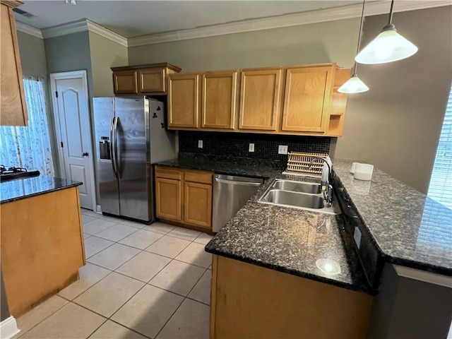 146 Emerald Oaks Dr, Covington, LA 70433 - kitchen with stainless steel appliances, backsplash, a peninsula, light tile patterned floors, and ornamental molding