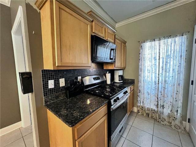 146 Emerald Oaks Dr, Covington, LA 70433 - kitchen with black microwave, gas stove, light tile patterned flooring, crown molding, and tasteful backsplash