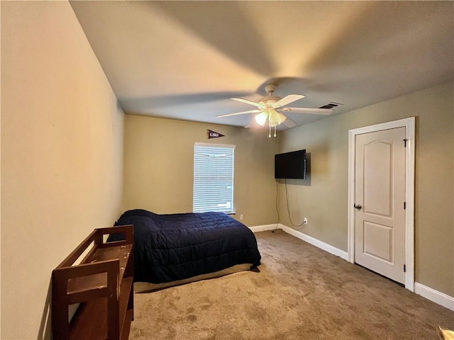 146 Emerald Oaks Dr, Covington, LA 70433 - carpeted bedroom featuring baseboards and a ceiling fan