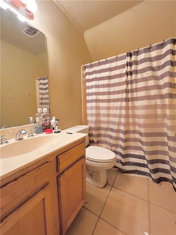 146 Emerald Oaks Dr, Covington, LA 70433 - full bath with vanity, tile patterned flooring, and curtained shower