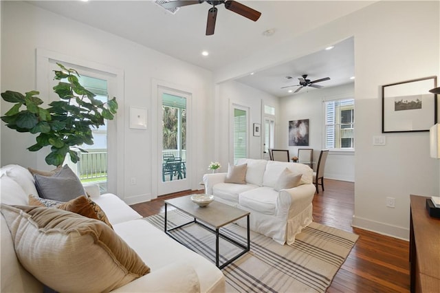 20810 S Scott St, New Orleans, LA 70119 - living area featuring a ceiling fan, healthy amount of natural light, wood finished floors, and recessed lighting