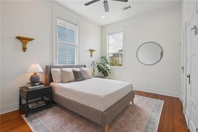 20810 S Scott St, New Orleans, LA 70119 - bedroom featuring multiple windows, wood finished floors, recessed lighting, and a ceiling fan