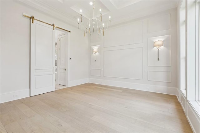 108 Dorrington Blvd, Metairie, LA 70005 - spare room featuring a barn door, light wood finished floors, a chandelier, a decorative wall, and beamed ceiling