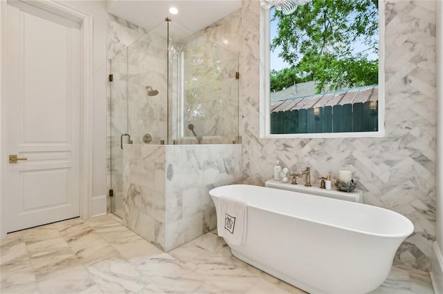 108 Dorrington Blvd, Metairie, LA 70005 - full bath with a marble finish shower, marble tiled floors, a freestanding tub, and tile walls