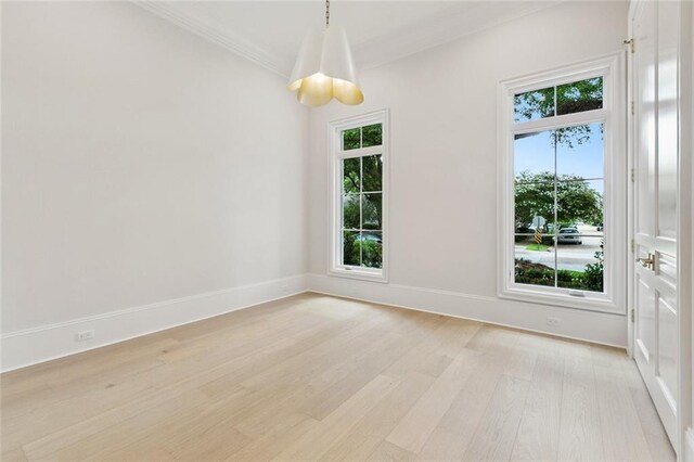 108 Dorrington Blvd, Metairie, LA 70005 - unfurnished dining area with light wood-style floors and ornamental molding