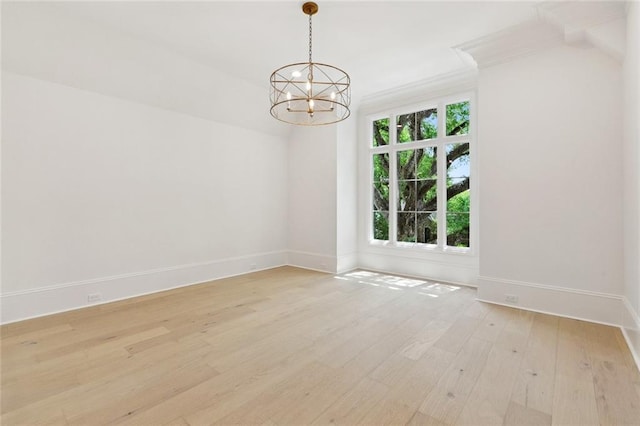 108 Dorrington Blvd, Metairie, LA 70005 - spare room featuring light wood finished floors and a chandelier