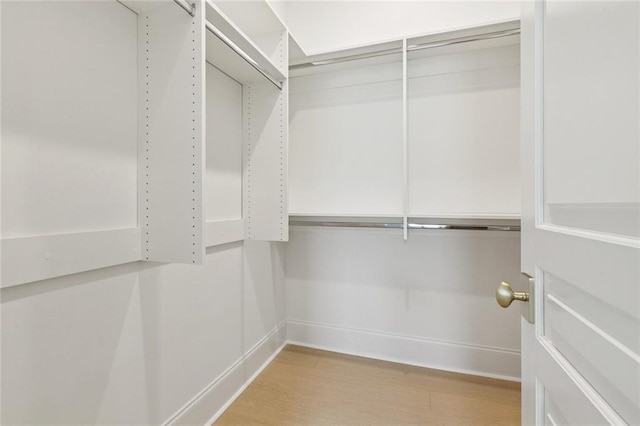 108 Dorrington Blvd, Metairie, LA 70005 - walk in closet with light wood finished floors