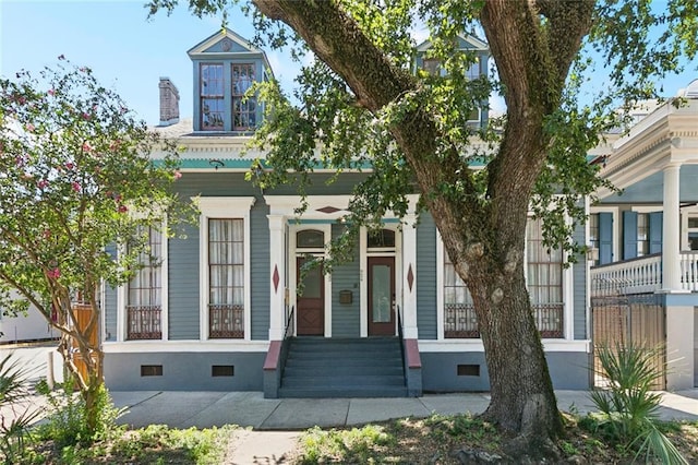 922 Elysian Fields Ave Unit B, New Orleans, LA 70117 - view of front of home with crawl space and a porch