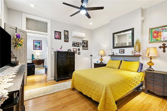 922 Elysian Fields Ave Unit B, New Orleans, LA 70117 - bedroom with a wall mounted air conditioner, light wood finished floors, recessed lighting, and ceiling fan