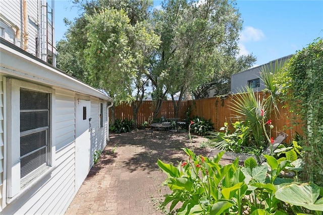 922 Elysian Fields Ave Unit B, New Orleans, LA 70117 - fenced backyard with a patio