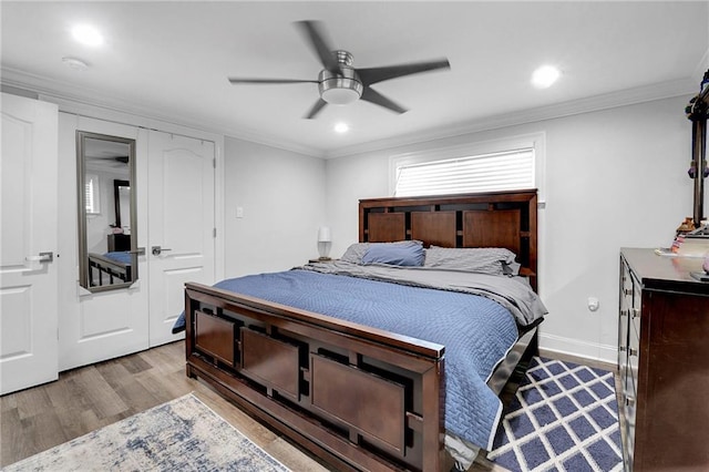 813 Cynthia Ave, Metairie, LA 70003 - bedroom with wood finished floors, crown molding, ceiling fan, and recessed lighting