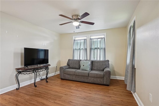 3713 Lausat St, Metairie, LA 70001 - living area with wood finished floors and ceiling fan