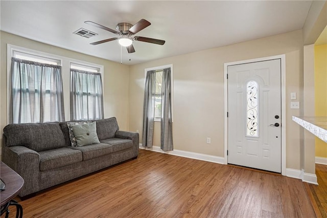 3713 Lausat St, Metairie, LA 70001 - living room with ceiling fan and wood finished floors