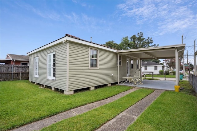 3713 Lausat St, Metairie, LA 70001 - back of property with a patio and a carport