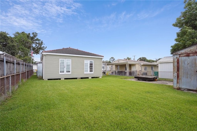 3713 Lausat St, Metairie, LA 70001 - rear view of property with a fenced backyard