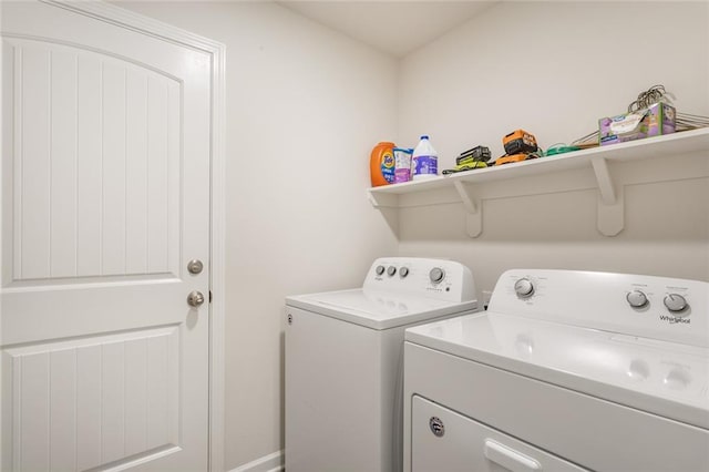 28399 Longfellow Ln, Albany, LA 70711 - laundry area featuring independent washer and dryer and baseboards