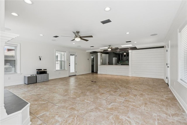 4625 Cleveland Pl, Metairie, LA 70003 - unfurnished living room with a ceiling fan, recessed lighting, crown molding, and light stone finish flooring
