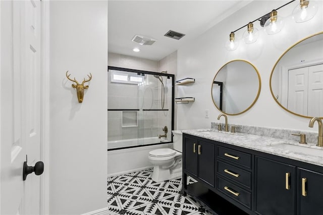 4625 Cleveland Pl, Metairie, LA 70003 - full bathroom featuring double vanity, shower / bath combination with glass door, and tile patterned floors
