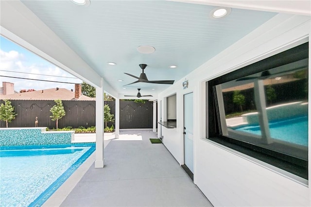 4625 Cleveland Pl, Metairie, LA 70003 - view of swimming pool featuring ceiling fan and a patio area