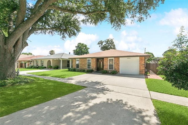 4513 Dreyfous Ave, Metairie, LA 70006 - ranch-style home featuring driveway, a garage, and brick siding