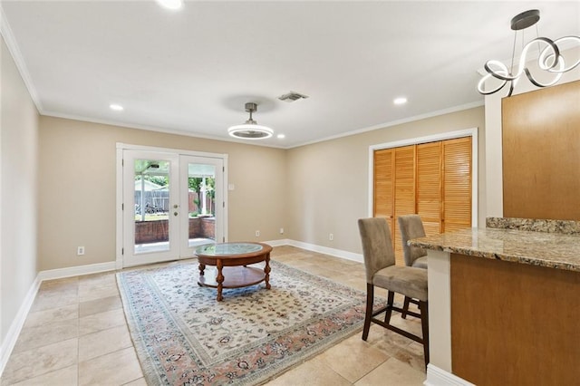 4513 Dreyfous Ave, Metairie, LA 70006 - living room with ornamental molding, light tile patterned flooring, recessed lighting, and french doors