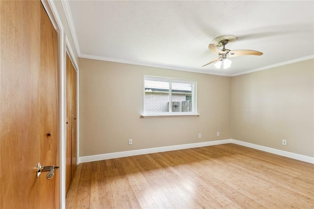 4513 Dreyfous Ave, Metairie, LA 70006 - unfurnished bedroom featuring ornamental molding, wood finished floors, a closet, and a ceiling fan