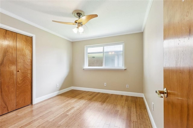 4513 Dreyfous Ave, Metairie, LA 70006 - unfurnished bedroom featuring light wood finished floors, ornamental molding, a closet, and a ceiling fan