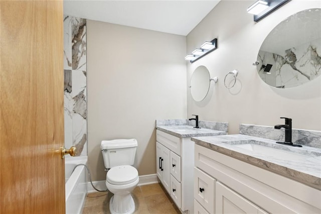 4513 Dreyfous Ave, Metairie, LA 70006 - full bathroom featuring two vanities, tile patterned flooring, and shower / bathtub combination