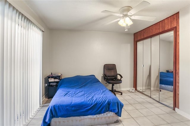 2330 Edenborn Ave Unit 116, Metairie, LA 70001 - bedroom featuring a ceiling fan, light tile patterned floors, and a closet