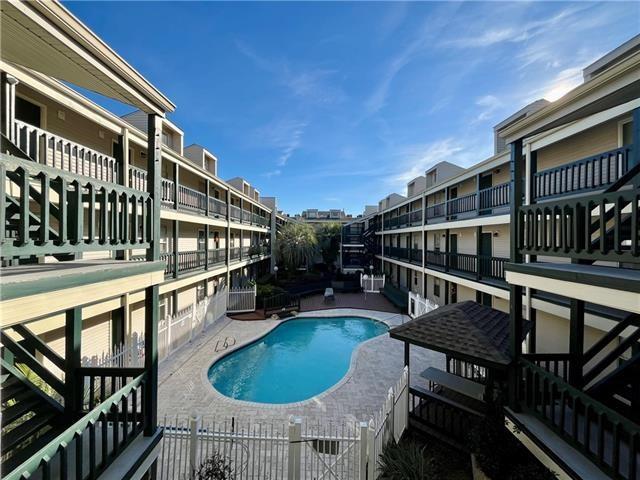 2330 Edenborn Ave Unit 116, Metairie, LA 70001 - community pool with a patio area